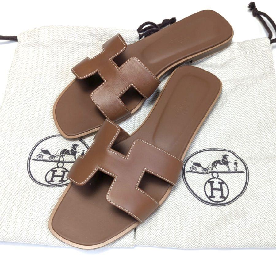 未使用さん♥エルメスHERMES オラン サンダル ゴールド 38.5